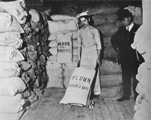 Part of Canadas gift of flour of the relief of war distress in England, 1915