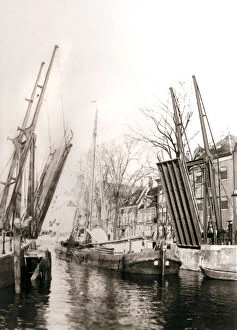Dordrecht Gallery: Canal bridge and boats, Dordrecht, Netherlands, 1898.Artist: James Batkin