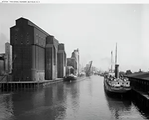 Warehouses Prints: The Canal harbor, Buffalo, N.Y. c.between 1910 and 1920. Creator: William H. Jackson
