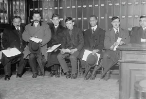 Paperwork Prints: Candidates for naturalization seated with papers, 1910. Creator: Bain News Service