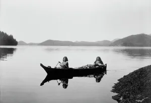 Canoeing Prints: Canoeing on Clayquot Sound, c1910. Creator: Edward Sheriff Curtis