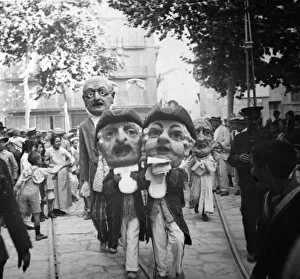 Images Dated 23rd May 2013: Caparrots and big heads parade through the streets of the city, during the Festivities