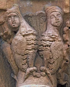 Capital decorated with antrozoomorphic figures outside the north gallery of the cloister