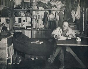 Captain Robert F Scott Collection: Captain Scott Writing His Diary in the Hut at Cape Evans, c1911, (1914). Creator: Herbert Ponting