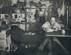 Captain Scott Collection: Captain Scott Writing His Diary in the Hut at Cape Evans, c1911, (1914). Creator: Herbert Ponting