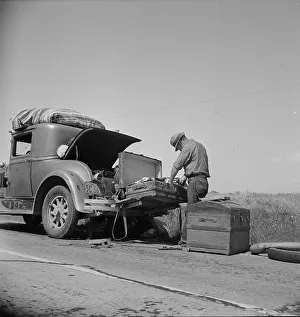 Trunk Prints: Car trouble on west side, Highway no33, San Joaquin Valley, 1938. Creator: Dorothea Lange