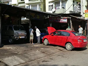 Servicing Prints: Car wash in West Bengal, India 2019. Creator: Unknown