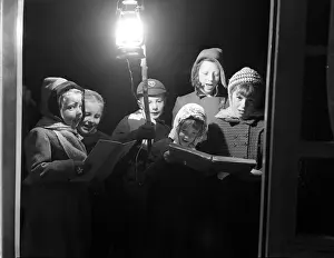 Lantern Prints: Carol singers, c1955. Creator: Arthur Charles Kirby Ware