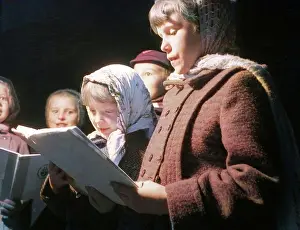 Christmas Prints: Carol singers, c1955. Creator: Arthur Charles Kirby Ware