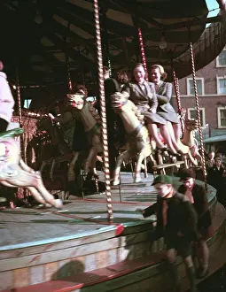 Fair Prints: Carousel at a fair, c1955-1965. Creator: Arthur Charles Kirby Ware