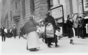 Baskets Prints: Carrying home Xmas baskets, between c1910 and c1915. Creator: Bain News Service
