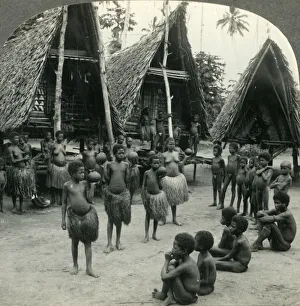 Traditional Culture Prints: Carrying Water in Coconut Shells - A Village Scene in New Guinea, c1930s. Creator: Unknown