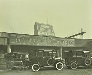 Advertising Hoarding Gallery: Cars parked outside London Bridge Station, 1931