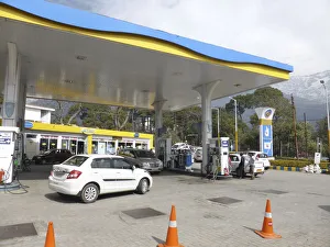 Cars re-fuelling at petrol station Dharamshala Himachal Pradesh. Creator: Unknown