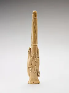 Alaska Prints: Carved harpoon foreshaft with two running foxes carved in relief