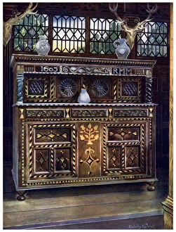 Storage Gallery: Carved and inlaid oak court cupboard, 1910.Artist: Edwin Foley