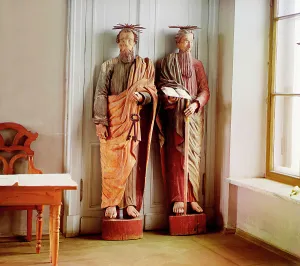 Halos Prints: Two carved wooden statues of bearded men with haloes above their head