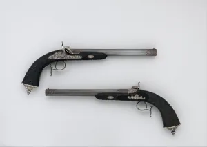 Ebony Prints: Cased Pair of Percussion Pistols with Accessories, French, Paris, dated 1856