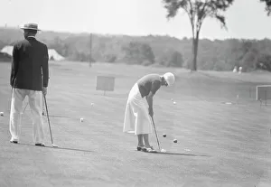 Golf Course Prints: Cassidy, Ellen, Mrs. playing golf, 1932 July. Creator: Arnold Genthe