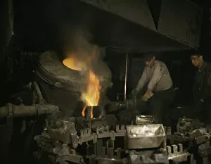 Casting Gallery: Casting a billet from an electric furnace, Chase Brass and Copper Co. Euclid, Ohio, 1942