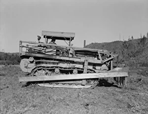 Caterpillar clearing land on cut...western Washington farm, Lewis County, Western Washington, 1939