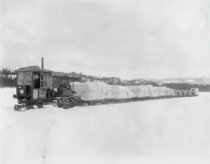 Freight Wagon Prints: Caterpillar hauling freight on the lake in spring to the Yukon