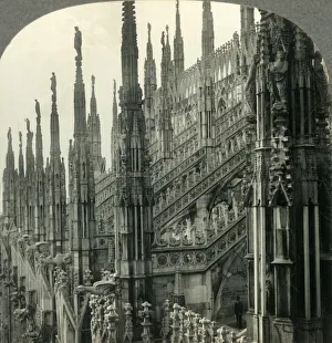 Milan Lombardy Italy Prints: The Cathedral of Milan, Italy - Up among Its Myriad Spires, c1930s. Creator: Unknown