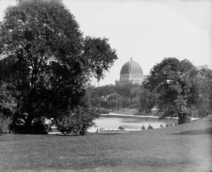 Central Park Prints: Central Park, New York, boat pond and Temple Beth-El, ca 1900. Creator: Unknown