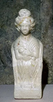 Breastfeeding Gallery: Ceramic figurine of a Mother Goddess, sitting in a chair and nursing a baby, 2nd century
