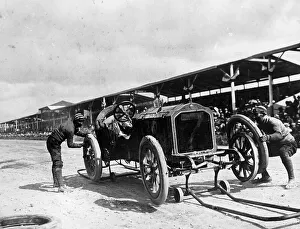 Fixing Prints: Changing the rims on a De Dietrich car, Coppa Florio Race, Italy, 1908