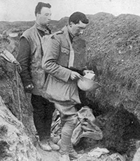Chaplain Prints: Chaplain of the lst Munsters saying a burial prayer over soldiers killed in their trench