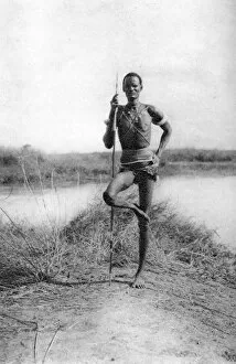A characteristic Dinka attitude, Terrakekka to Aweil, Sudan, 1925 (1927). Artist: Thomas A Glover