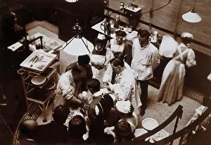 Charing Cross Hospital: Stanley Boyd in the old operating theatre, 1900 (1906). Creator: Unknown