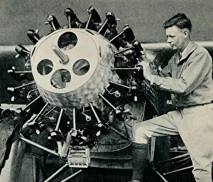 Solo Prints: Charles Lindbergh checking the engine of his aircraft before his transatlantic flight