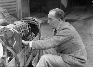 Motor Maintenance Gallery: Charles Mortimer working on the engine of a MG KN Special, c1930s Artist: Bill Brunell