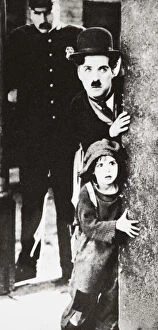 Charlie Collection: Charlie Chaplin and Jackie Coogan in The Kid, 1921