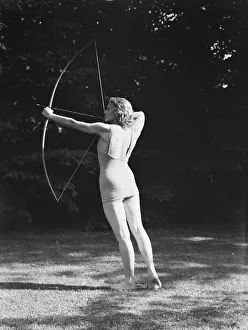 Sportswoman Prints: Chase, Diana, Miss, doing archery, 1933 June 22. Creator: Arnold Genthe