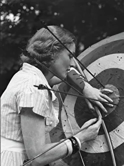 Target Practice Prints: Chase, Diana, Miss, doing archery, 1933 June 22. Creator: Arnold Genthe