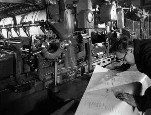 Checking printed pages from a two colour press, Mexborough, South Yorkshire, 1959