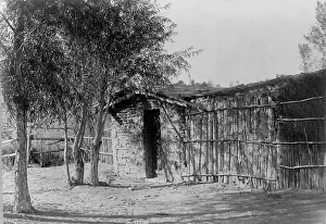 Logs Prints: Chemehuevi modern home, c1907. Creator: Edward Sheriff Curtis