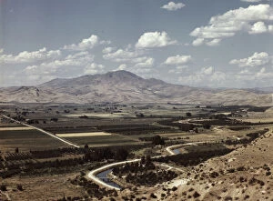 Cherry Trees Collection: Cherry orchards, farm lands and irrigation ditch at Emmett, Idaho, 1941. Creator: Russell Lee