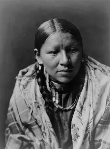 Cheyenne Prints: Cheyenne young woman, c1910. Creator: Edward Sheriff Curtis