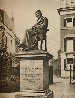 In Cheyne Walk Gardens Thomas Carlyle Eternally Ponders Philosophy, c1935. Creator