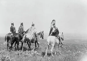 Chief Collection: The chief and his staff, Apsaroke Indians, c1905. Creator: Edward Sheriff Curtis