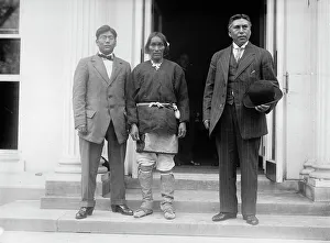 Suits Prints: Chief Yukeoma, center, 1911. Creator: Harris & Ewing