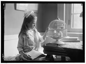 Caged Prints: Child with birdcage, between 1910 and 1917