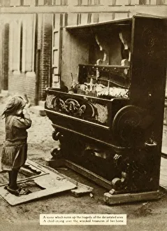 Damage Prints: Child with damaged piano after an air raid made her homeless