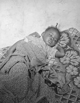 Living Conditions Gallery: Child seriously ill from an infection caused by a rat bite in her home... Washington, D.C. 1942
