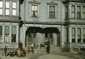 Tenement Prints: Children with adult in the tenement district