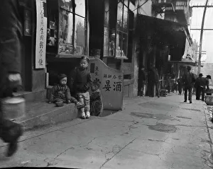 Shop Window Prints: Three children in front of a cellar door